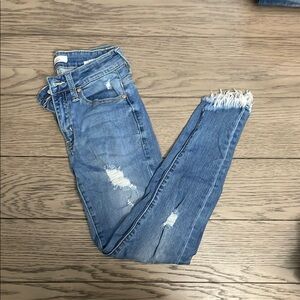 Distressed Blue Jeans